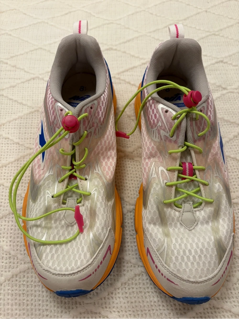 Avia Women's White Athletic Running Shoes with Blue, Pink and Yellow Accents
